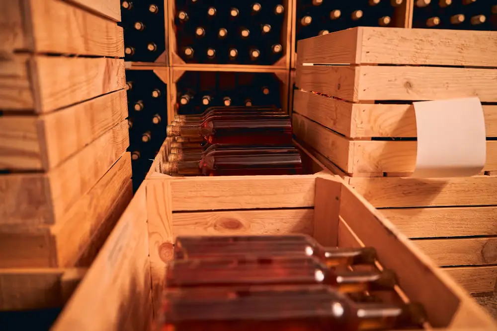 Wooden wine cases stacked in a cellar