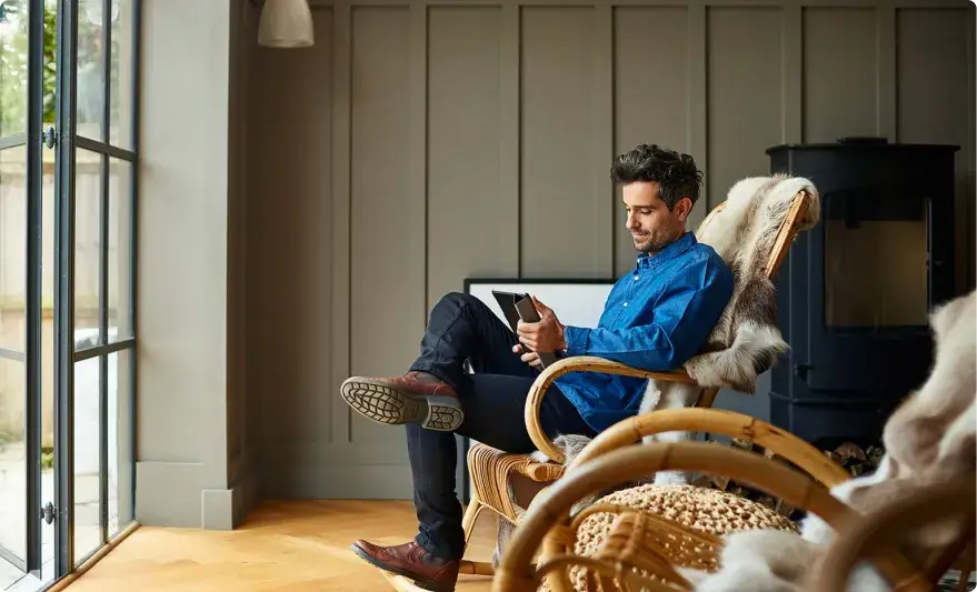 young man reclining in living room