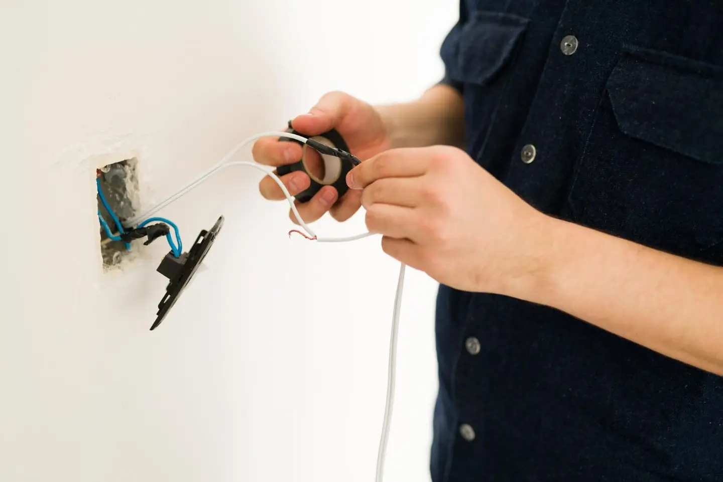 man hands repairing the broken switch