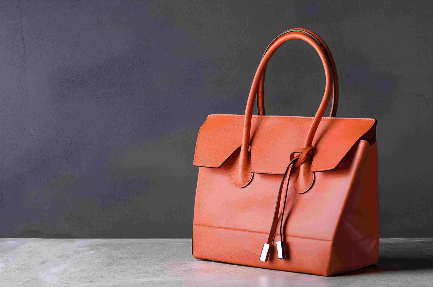 Orange leather designer handbag