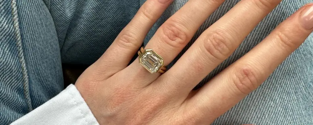Hand wearing a diamond ring