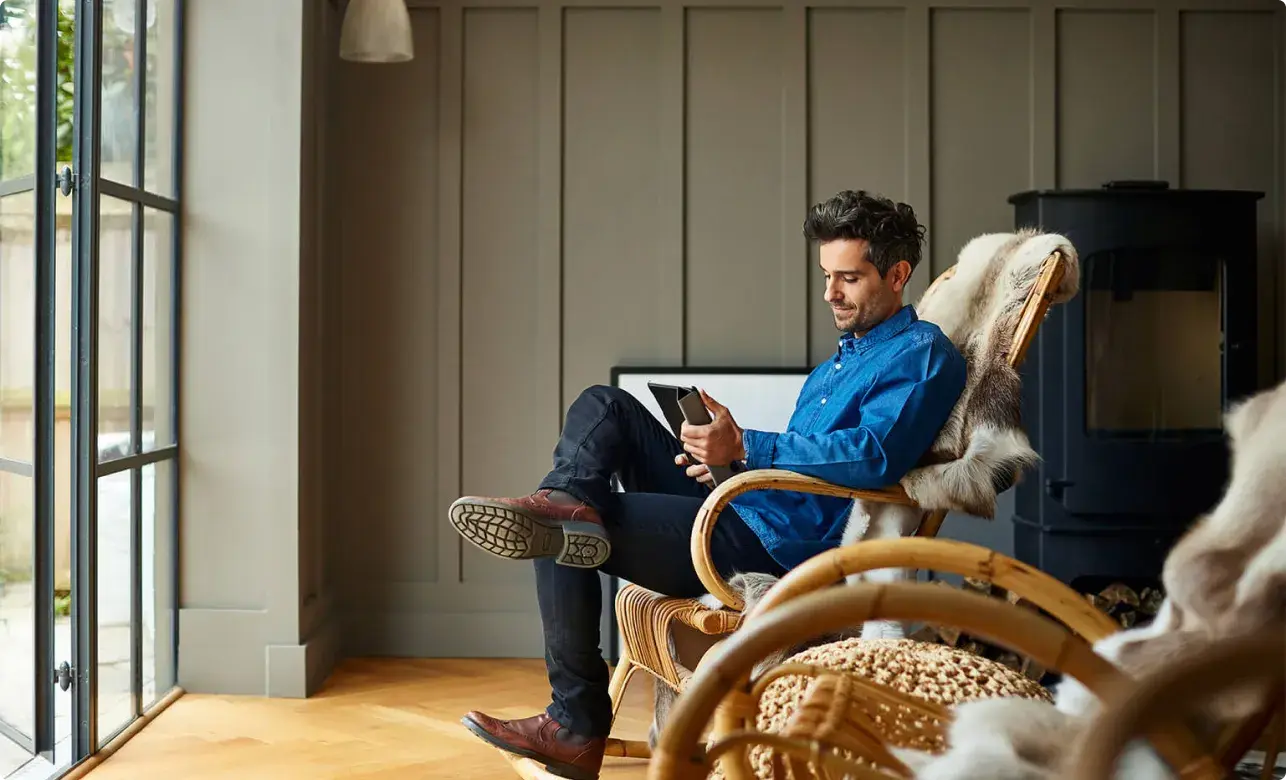 Man relaxing in a chair at home
